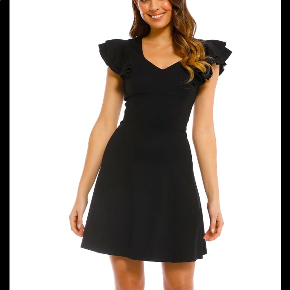 Simply beautiful Black cocktail dress. Size:M